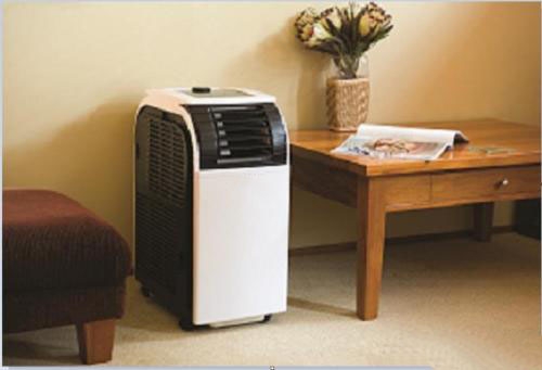 采用高温除湿机将现有干燥室（烘箱）的余热排到空气中作为热源